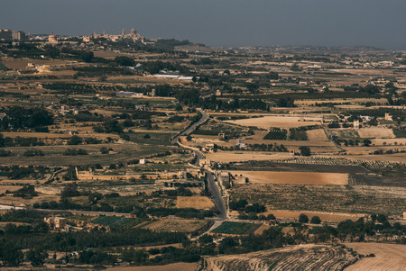 View to agriculture fields in countryside of Malta from the hillの写真素材