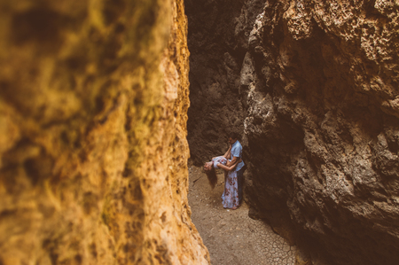 Man and woman walking in the cleft on nature, Maltaの写真素材