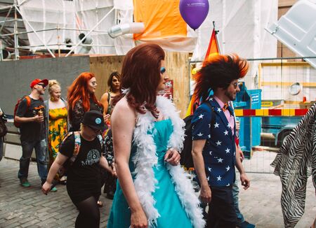 Helsinki, Finland - June 29, 2019: Participants from Burlesque show in bright clothing on Helsinki Pride festival on the streetのeditorial素材