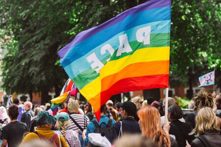 Helsinki, Finland - June 29, 2019: People with rainbow flag on street on Helsinki Pride festivalのeditorial素材