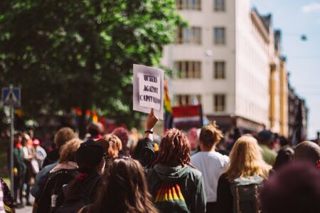 Helsinki, Finland - June 29, 2019: Antifascism activists with posterのeditorial素材