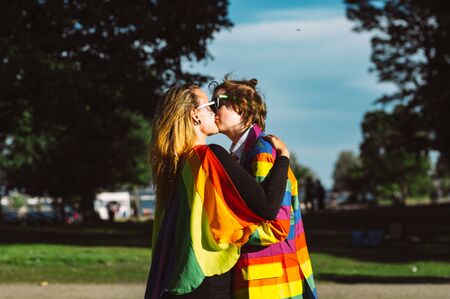 Helsinki, Finland - June 29, 2019: Two girls kissing on Helsinki Pride festival in Kaivopuisto public parkのeditorial素材