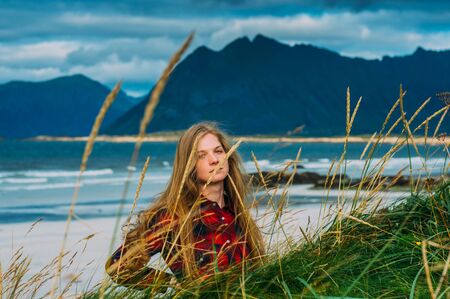 Portrait of beautiful girl in Saupstad, Lofoten Islands, Norwayの写真素材