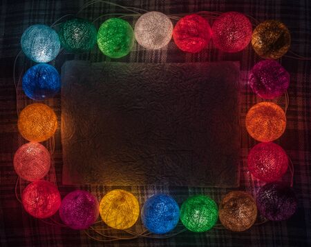 Colorful garland with space for text on the caged backgroundの写真素材