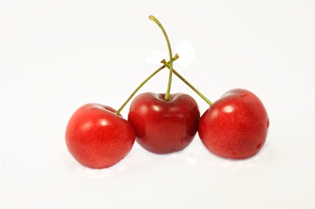 cherries isolated on white backgroundの写真素材
