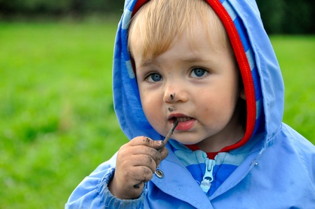 Little boy with dirty faceの写真素材