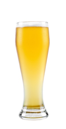 beer into glass isolated on whiteの写真素材