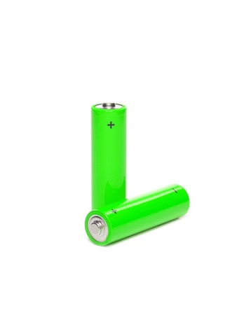 Two green batteries isolated on a white background  の写真素材