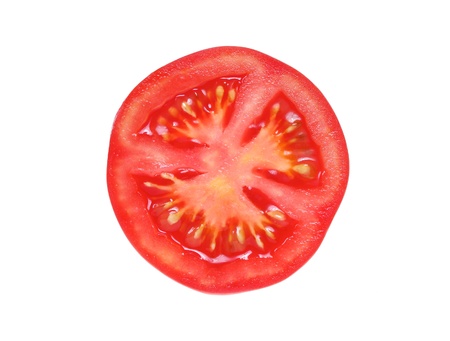 slice of tomato isolated on whiteの写真素材