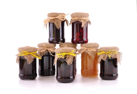 jam in the glass jars on whiteの写真素材