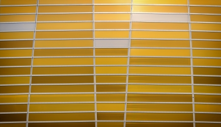 shaded amber striped background with aluminium stripes