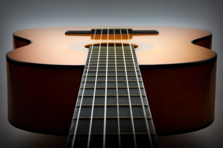 Classical guitar lying flat, vignetteの写真素材