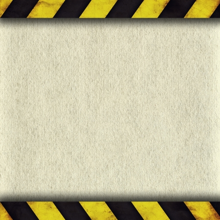 Background with warning stripes and old paperの写真素材