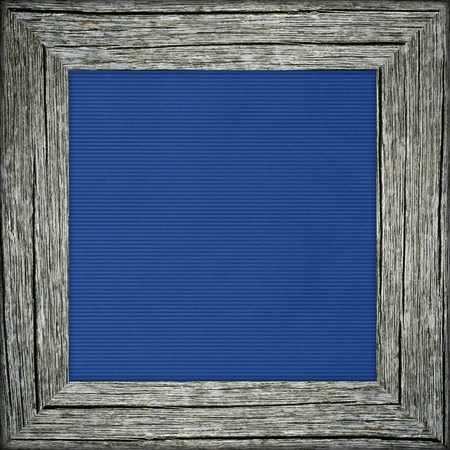 Old raw wooden frame with blue striped canvas