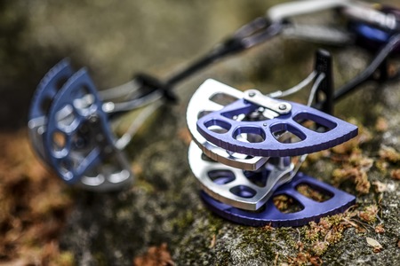 Climbing gear friend lying on a rock, outdoorの写真素材