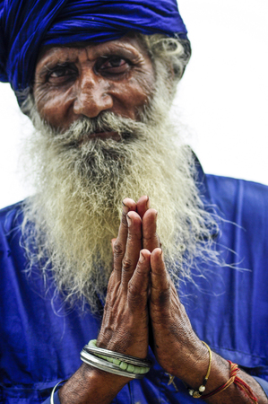 Amritsar, India, september 4, 2010: Old indian man with his hands folded into prayer. India.のeditorial素材