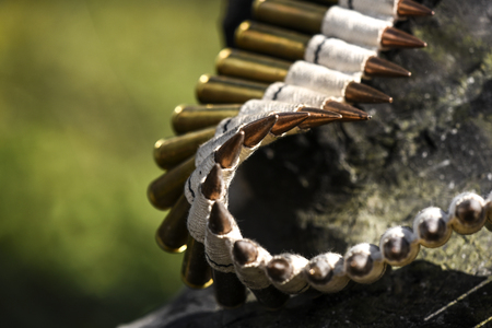 Bullets in ammunition belts outdoor for machine gun.の写真素材