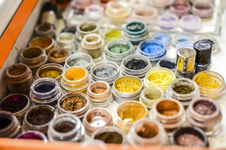 Make up colorful cosmetics in circle boxesの写真素材