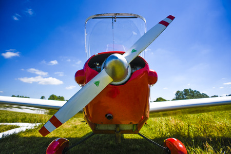 Wing of the small plane on the ground.