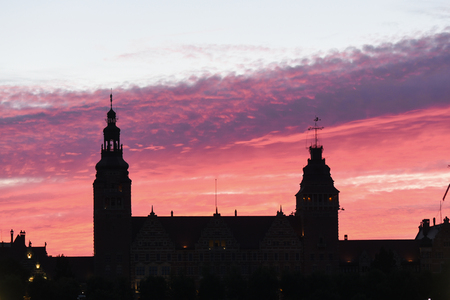 Sunset in Szczecin, pink clouds over Voivodeship Office in Szczecin, Poland.のeditorial素材