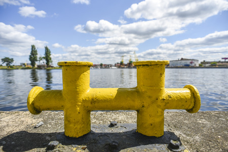 Old bitt on the waterfront overlooking the boulevards in Szczecin.