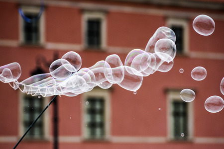 Soap bubbles on the background of architecture.の写真素材