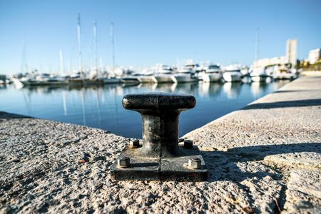 Mooring, bitt at the marina, old and large.