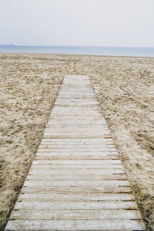 Wooden jetty on the beach. Wooden jetty on the beach.