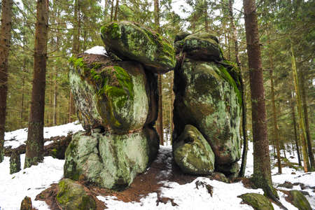 Natural sandstone rock formations in the Table Mountains in Poland. The Rock City.