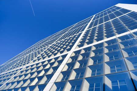 Textura of modern buildings, glazed financial and residential surfaces.