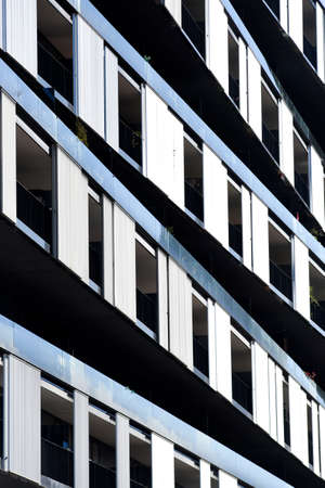 Textura of modern buildings, glazed financial and residential surfaces.