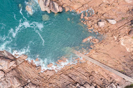 Red granite coast landscape in France.の写真素材