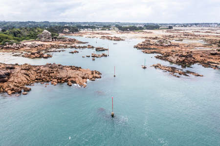 Red granite coast landscape in France.の写真素材