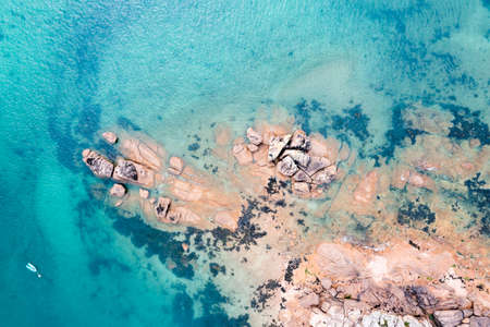 Red granite coast landscape in France.の写真素材