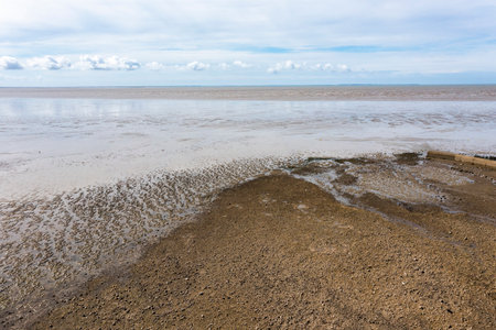 Sea landscape, low tide on the Atlantic Ocean in France.の写真素材