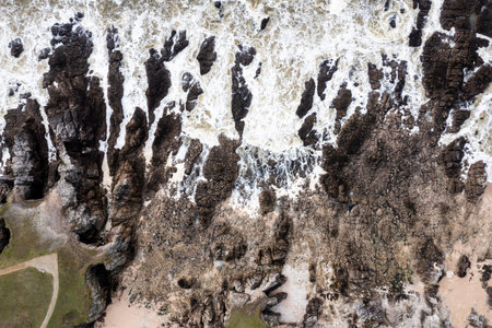 Rocky ocean coast in France, view from a drone.