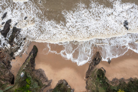 Rocky ocean coast in France, view from a drone.