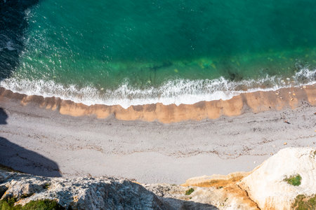 Texture of landscape of turquoise beach and golden sand, heavenly beach by drone.の写真素材