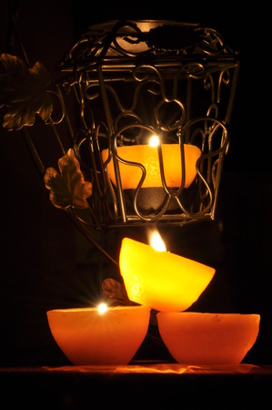 Lamp, candle shining in the darkness. Challis flame. Artistic composition. Lighting.の写真素材