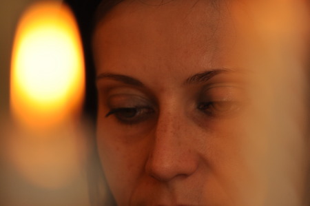 The woman conversing and thoughtful. Girl with earrings. Smile and satisfaction.の写真素材