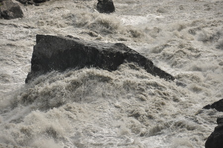 Inguri River. Georgia. Strong current and high level in the river.