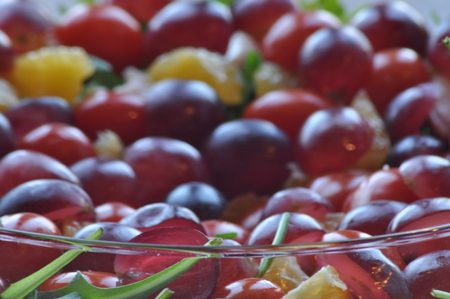 Salad in a glass dish. Rocket salad with grapes.の写真素材