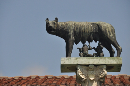 The statue of Romulus and Remus with the Capitol wolf, who feeds their own milkの写真素材