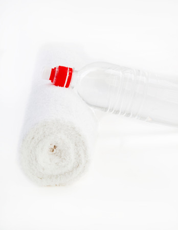 Bottle of water and towelの写真素材