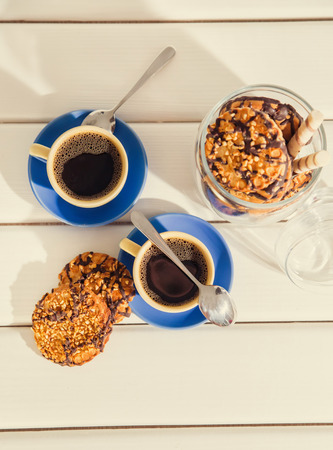 hot coffee and cookies in morning. Soft vintage colorsの写真素材