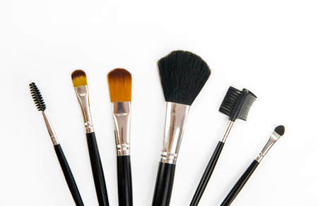 different professional cosmetic brushes on white backgroundの写真素材