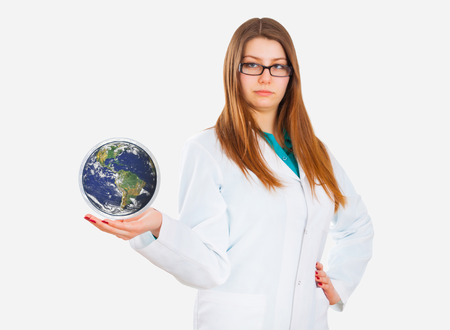 young medical doctor woman wirh earth globe â??の写真素材