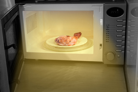 grilled chicken leg in microwaveの写真素材