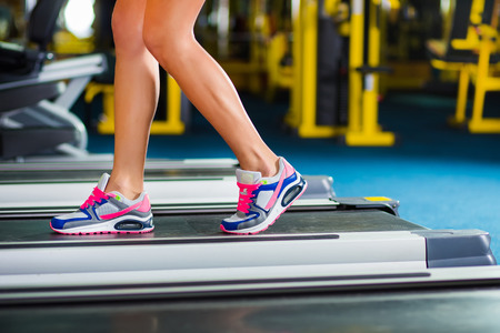 woman in gym running