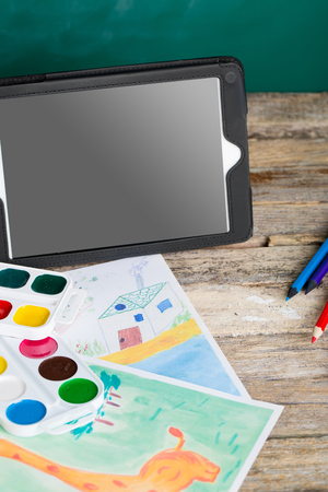 Tablet pc and different schoolchild and student studies accessories. Back to school concept.の写真素材